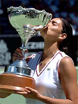 Eleni Daniilidou of Greece kisses the trophy after her 6-3, 6-2 win over Ashley Harkleroad of the US 