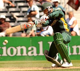 Pakistan's Abdul Razzaq swings on his way to 50 not out against New Zealand in Christchurch on Saturday