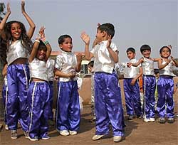 Tiny tots present a dance number at a function at Dikshant International School