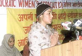 Geeta who lost her husband for marrying outside the caste at Jahan Khelan in Hoshiarpur district, addressing the delegates at a convention against �Honour� killings in the Capital on Sunday. Geeta�s mother-in-law is also seen in the picture. 