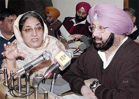 Punjab Chief Minister Amarinder Singh and Agriculture Minister Rajinder Kaur Bhattal at a meeting to review the arrangements for Ms Sonia Gandhi�s Bathinda visit in Chandigarh