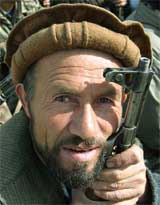 An Afghan militant waits for his turn at the UN backed disarmament drive called "Disarmament, Demobilisation and Reintegration", in Kabul on Sunday