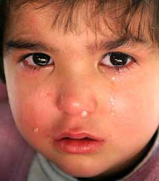 A girl cries at a children's' art therapy centre in Baghdad on Tuesday
