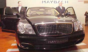 Managing Director and CEO of DaimlerChrysler India Hans-Michael Huber (L) and Chairman Helmut Petri unveil the Maybach, a new model from Mercedes-Benz, on the eve of the 7th Auto-Expo 2004 in New Delhi on Thursday.