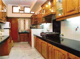 A modern kitchen has been created by using components of a modular kitchen