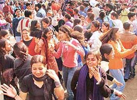 Students dance at Student Centre,Panjab University, to mark the Flowers Day in Chandigarh