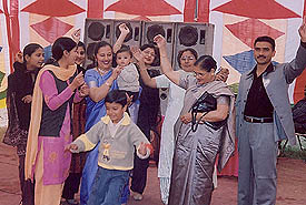 Family members rejoice over the birth of a baby girl