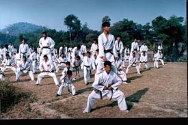 Students learn traditional karate skills during the 10-day senior winter karate camp at Kangra