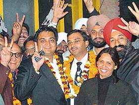 Mr Sajal Kosar shows victory sign after being re-elected as president of the District Courts Bar Association in Chandigarh