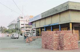 Bricks and sand market at public land near Model Town Extension gurdwara