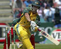 Australia's Adam Gilchrist hits a six during match against Zimbabwe in Hobart 