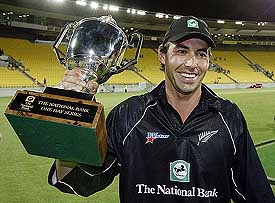 New Zealand captain Stephen Fleming holds the trophy after winning the fifth one-day match against Pakistan at Wellington 