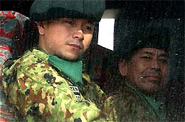 Japanese troops arrive at Virginia, 46-km south of the Iraqi border, in northern Kuwait on Saturday