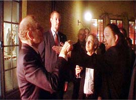 Israel's Ambassador to Sweden Zvi Mazel argues with artist Dror Feiler at Stockholm�s Museum of National Antiquities