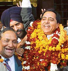 Mr Jadish Arora in jubilant mood after being re-elected president of the Chandigarh Beopar Mandal