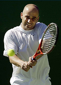 Fourth-seeded Andre Agassi of the US returns a backhand during a sponsored event after his practice session in Melbourne 