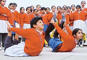 Students of Carmel Convent School rehearse a yoga item for Republic Day celebrations in Chandigarh