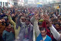 Industry workers raise slogans in support of their demands 