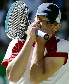 Top seed Andy Roddick of the US reacts to a line call during his first round match against Chile's Fernando Gonzalez 