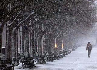 A man walks during heavy snowfall in Berlin 