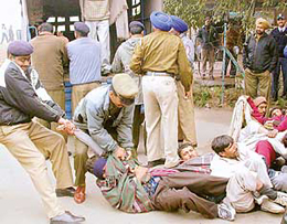Cops rough up blind protesters in front of the Haryana Secretariat  in Chandigarh on Tuesday. 