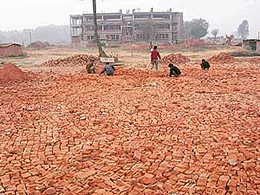 Construction of a tennis court is in progress as part of the new sports facilities at Ananda International School.