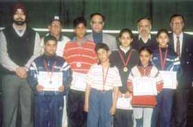 The winners and runners up of the badminton talent contest with former Asian champion Dinesh Khanna, Delhi Badminton Association vice-president S P Singh and organising secretary V K Bhatia.