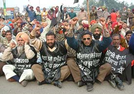 PSEB employees protest against the privatisation of the power board in Amritsar on Tuesday.