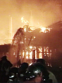 Firefighters tackle the blaze after an explosion at Algeria�s largest refinery and principal oil exporter in the port city of Skikda