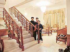 Kanchan Sharma with her children Himank and Ibna in their house in Mohali