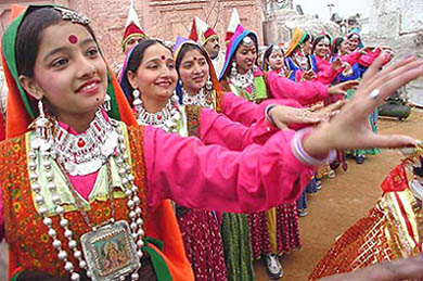 Himachali girls perform a traditional dance during the press preview of the Himachal Pradesh tableau for the Republic Day parade in the Capital
