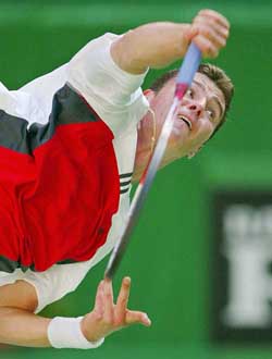 Marat Safin serves to Finland's Jarkko Nieminen at the Australian Open on Wednesday