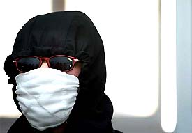 The third Chinese patient to be diagnosed with SARS this year talks to newsmen