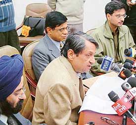 Adviser Lalit Sharma addresses a press conference announcing the arrest of jail personnel allegedly involved in the escape of three accused in the Beant Singh assassination case. 