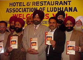 Mr Harjinder Singh, Joint Commissioner, Municipal Corporation, releases the directory of hotels and restaurants 