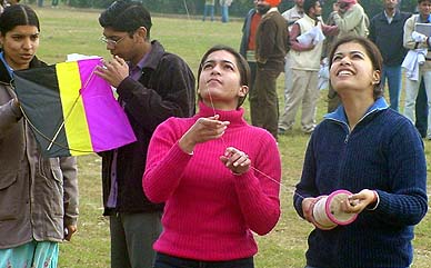 Students of Punjab Agricultural University take part in a kite-flying competition on the varsity campus