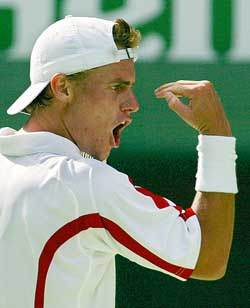 Australia's Lleyton Hewitt celebrates winning a point during his second round 