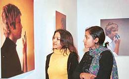 Visitors to the Alliance Francaise art gallery in Sector 36 admire the photography exhibition put up by French artist Frederic Pollet on Friday.