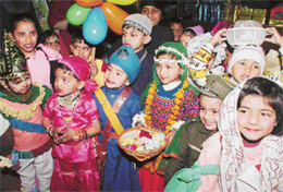 Students of Government Model Senior Secondary School, Sector 35, take part in a fancy dress competition held on the school premises in Chandigarh on Friday.