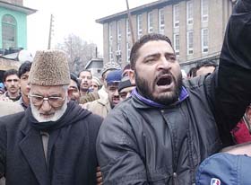 Supporters of Syed Ali Shah Geelani raise slogans against Centre-Hurriyat talks in Srinagar on Friday. 