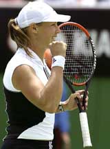 Australia's Alicia Molik celebrates her third round 6-7, 6-1, 6-2 win against Luxembourg's Claudine Schaul