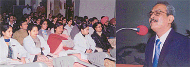 Dr Dilip Deshpande delivers a lecture on dental implants at Dumra Auditorium, DMCH