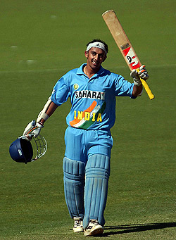 Rohan Gavaskar of India celebrates after completing his half-century