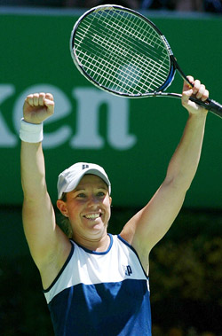 Lisa Raymond of the US celebrates her win over compatriot and third seed Venus Williams