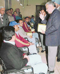 GOC-in-C Western Command, Lieut-Gen S.S. Mehta, interacts with inmates of the Paraplegic Rehabilitation Centre in Mohali