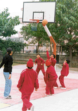 Students of Shemrock Senior Secondary School, Mohali, play basketball on the school campus