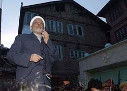 APHC chairman Moulvi Abbas Ansari address his supporters after his arrival from Delhi in Srinagar 