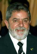 Brazilian President Luiz Inacio Lula da Silva smiles before the start of delegation level talks in New Delhi 