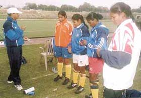 The Indian women�s hockey team players are all ears as chief coach M.K. Kaushik gives vital tips to the team