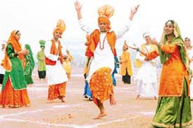 Schoolchildren perform bhangra at a Republic Day function in Panchkula on Monday.
